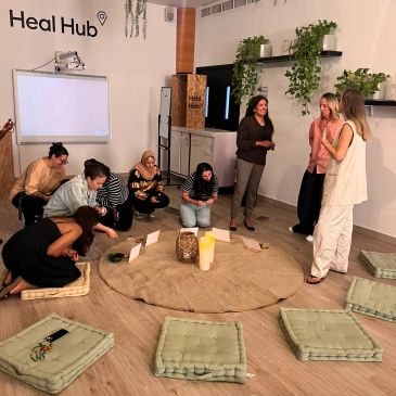 Group participating in a workshop in a serene room.