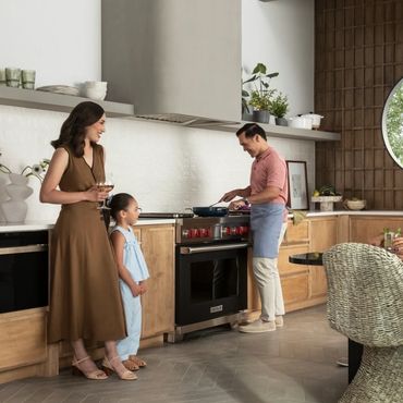 Family cooking and spending time together in the kitchen.