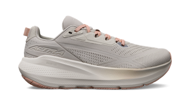 Light gray and blush running shoe with thick sole.