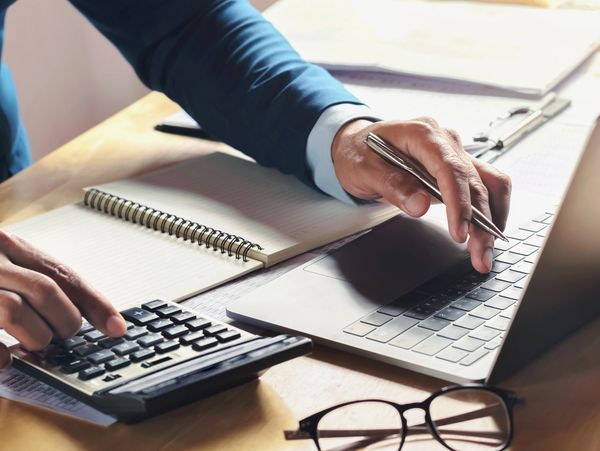 An accountant working at a desk