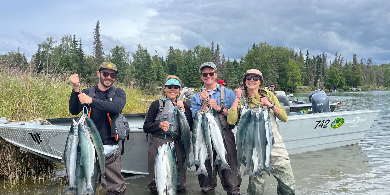 A happy family with a limit of Kenai River Sockeye Salmon for the freezer. 