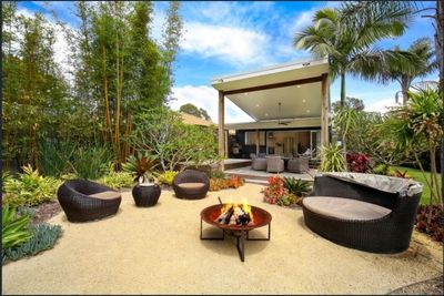 New outdoor pergola addition and firepit area to home renovation in Patonga