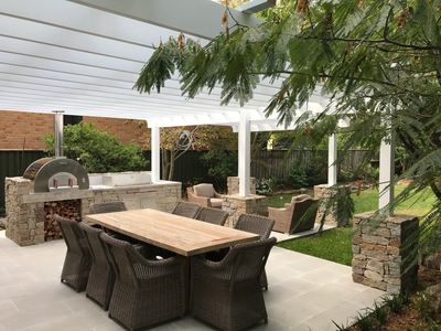 Outdoor Hamptons Pergola with stone cladding and outdoor pizza oven in Castle Hill, NSW