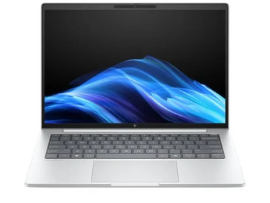 Sleek silver laptop with a vibrant blue wave wallpaper on the screen.