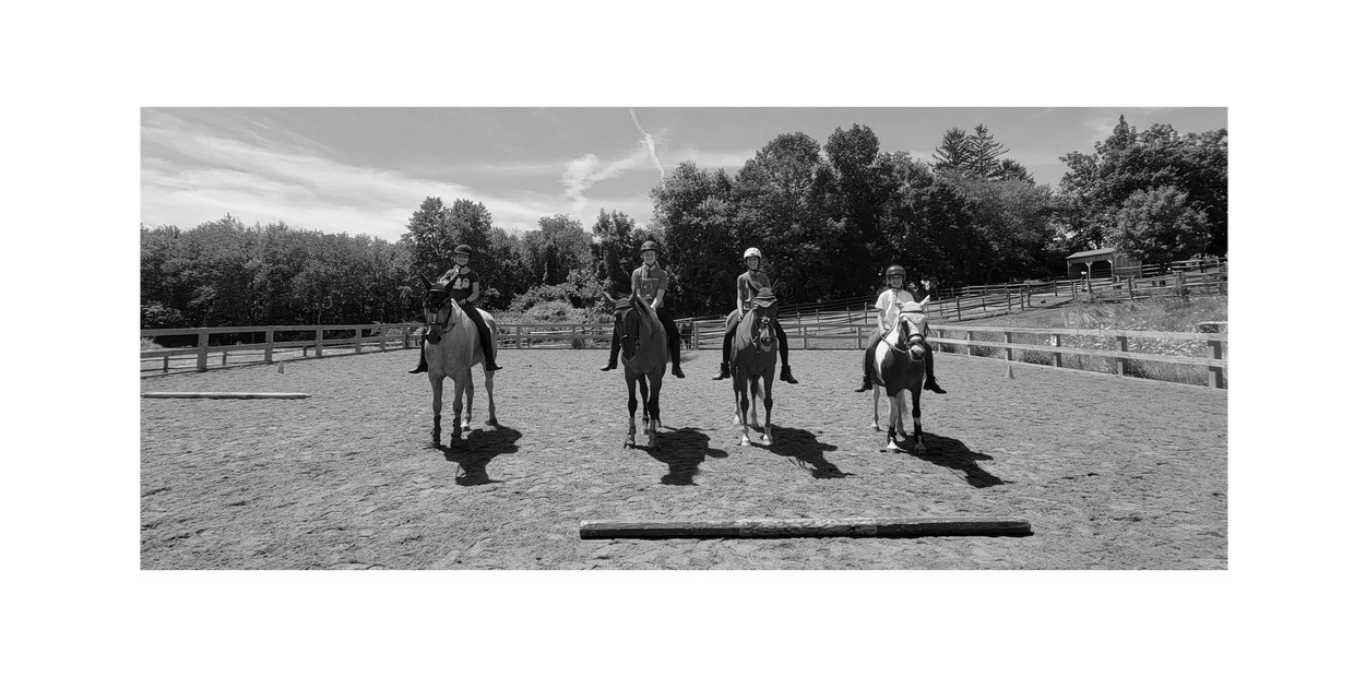 The Common Stables students in group lesson