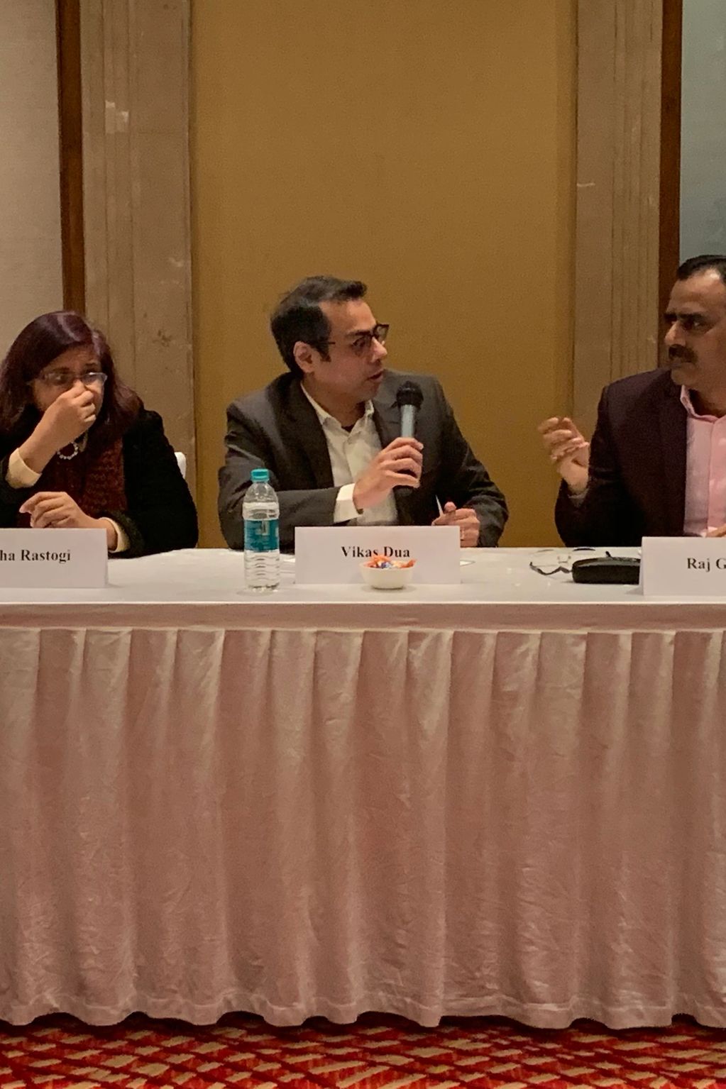 Vikas Dua moderating a panel discussion