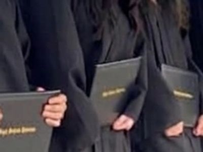 The Haven Academy graduates in caps and gowns