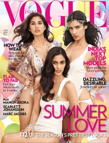 Cover of Vogue India featuring three models in summer fashion.
