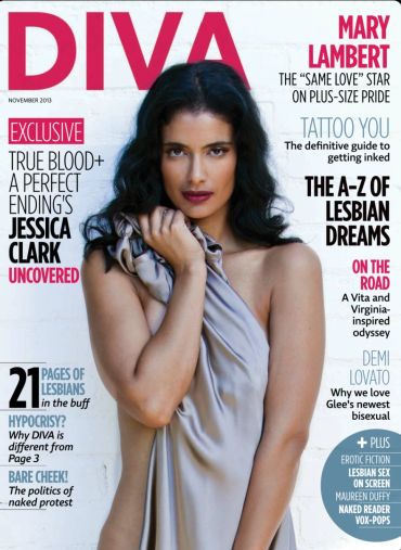 Magazine cover featuring a woman wrapped in a silver cloth.