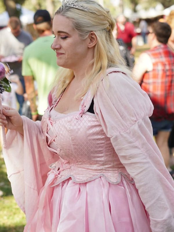 a picture of Miranda dressed as Princess Poppy, her character for the River sanse festival