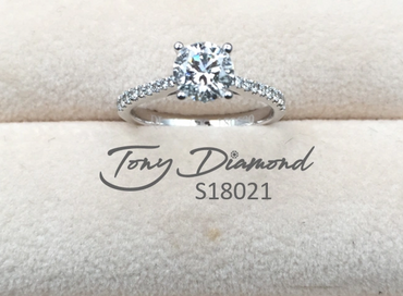 Tony Diamond, 0.80ct Round Diamond Engagement Ring with side diamonds,.