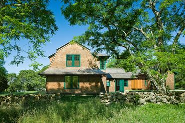 Red cedar shingle-style New England home located in Westport, Massachusetts 