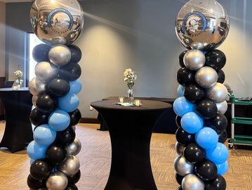 Balloon Column. Silver  balloons. White balloons. Balloons near me 92618. Balloon Stylist in Irvine.