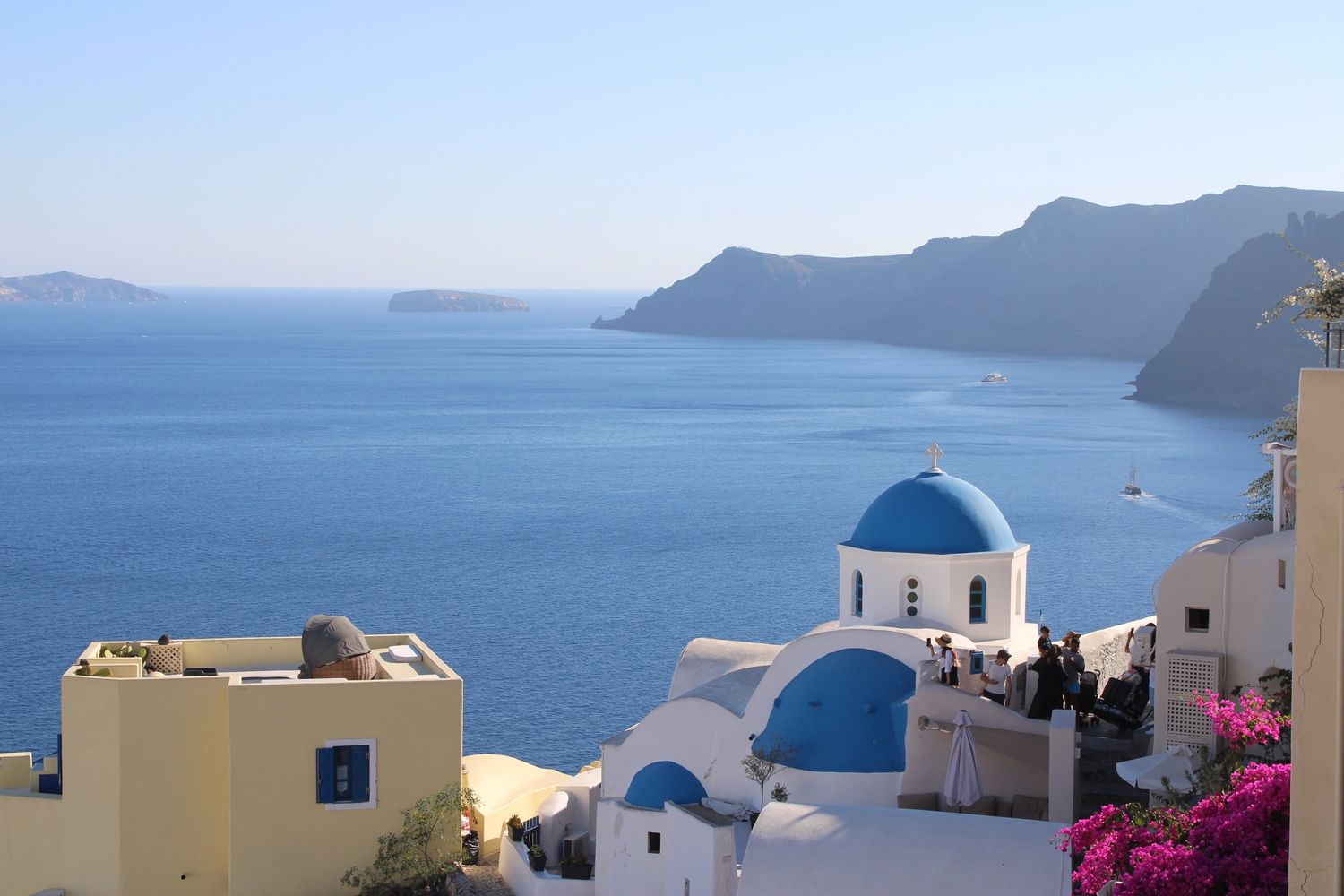 Iconic blue domed church in Oia, Santorini, Greece