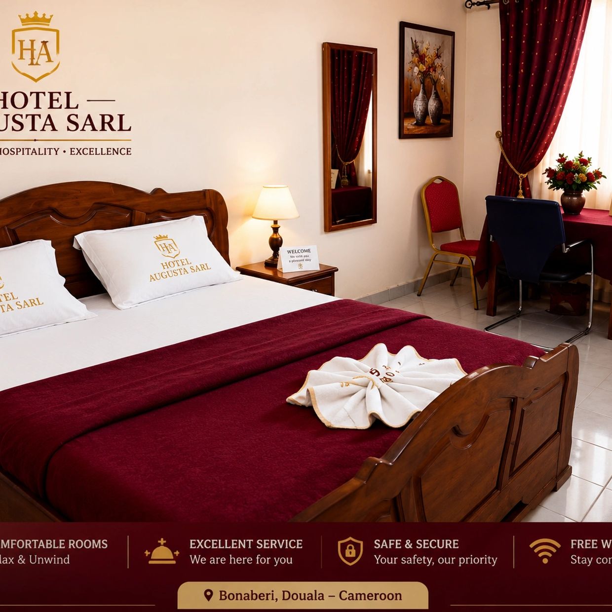 Cozy hotel room with maroon decor and wooden furniture.