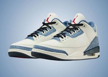 A pair of white and blue Air Jordan sneakers with red logo accents.