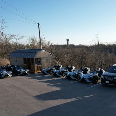 Sun, speed, and adventure at Lake Ozark — 8 Polaris Slingshots lined up and ready for the ride of yo
