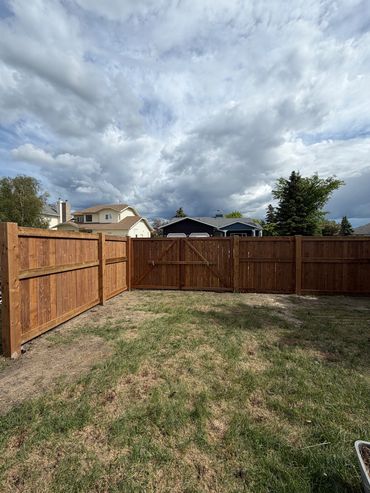 Pressure treated fence with RV gate.