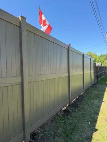 Grey Vinyl Fence with Wood Grain 