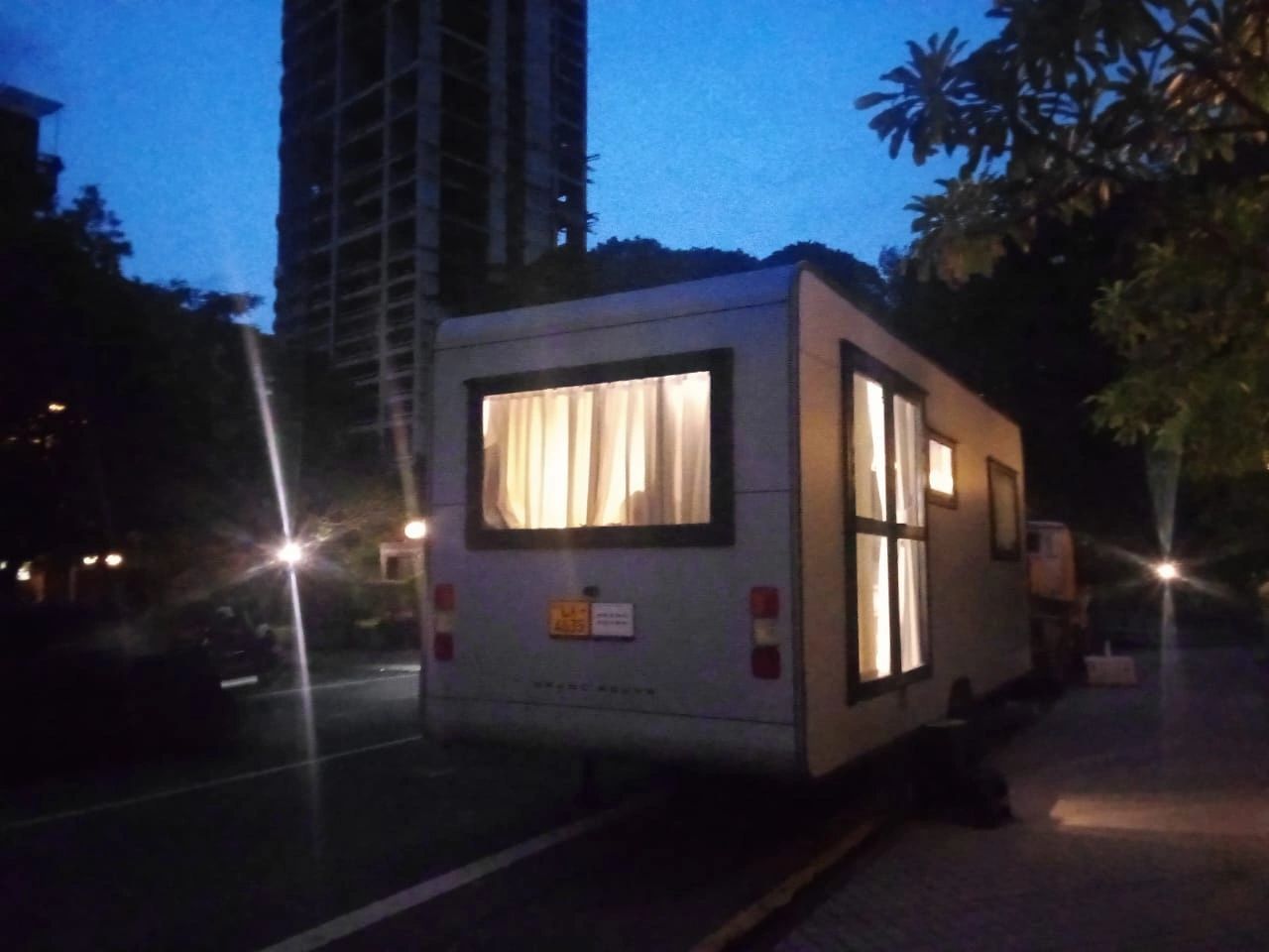 Grand Rover luxury caravan movable hotel suite parked in Colombo Sri Lanka at night.