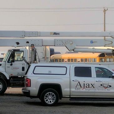 Two white trucks