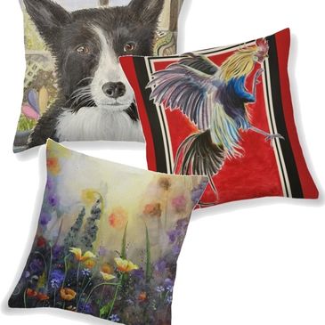Three pillows with a different image on each: A black and white dog, a colorful rooster against a re