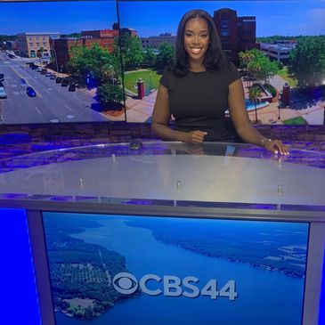 Former University of West Georgia Students Cheyanne Walker pictured sitting at news desk of CBS 44 