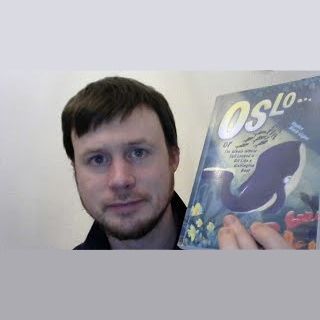 Stephen Bench-Capon with his book, Oslo or The Whale Whose Tail Looked a Bit Like a Wellington Boot.