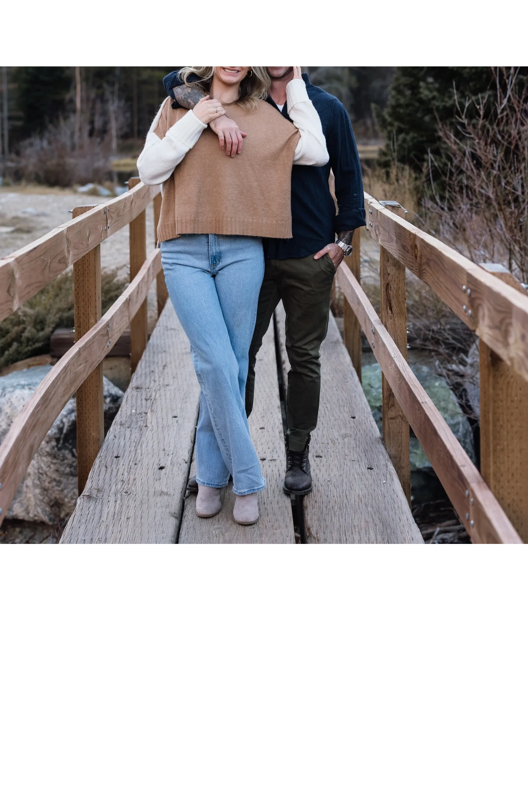 A couple holding each other and reconnecting emotionally after  trauma relationship therapy