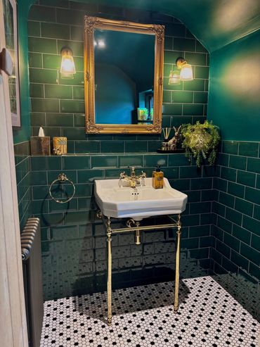 Burlington basin with green metro wall tiles black and white mosaic floor tiles 