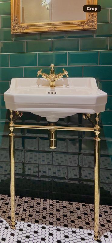 Burlington free standing basin with gold tap and gold basin legs as well as cradle 