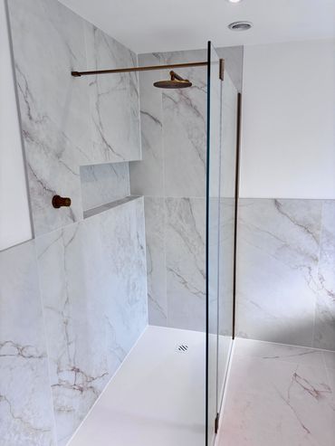 Lusso Stone shower glass panel and flipper - Lusso Stone concealed shower valve 