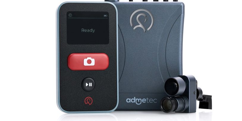 A modern medical device with a display, buttons, and camera components.