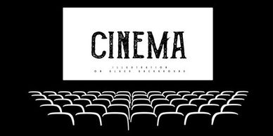Empty cinema hall with a large screen displaying the word 'CINEMA'.