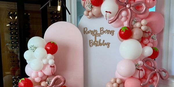 A beautiful custom installation for a BERRY 1ST BIRTHDAY. Hough & Puff Balloons LLC can customize an
