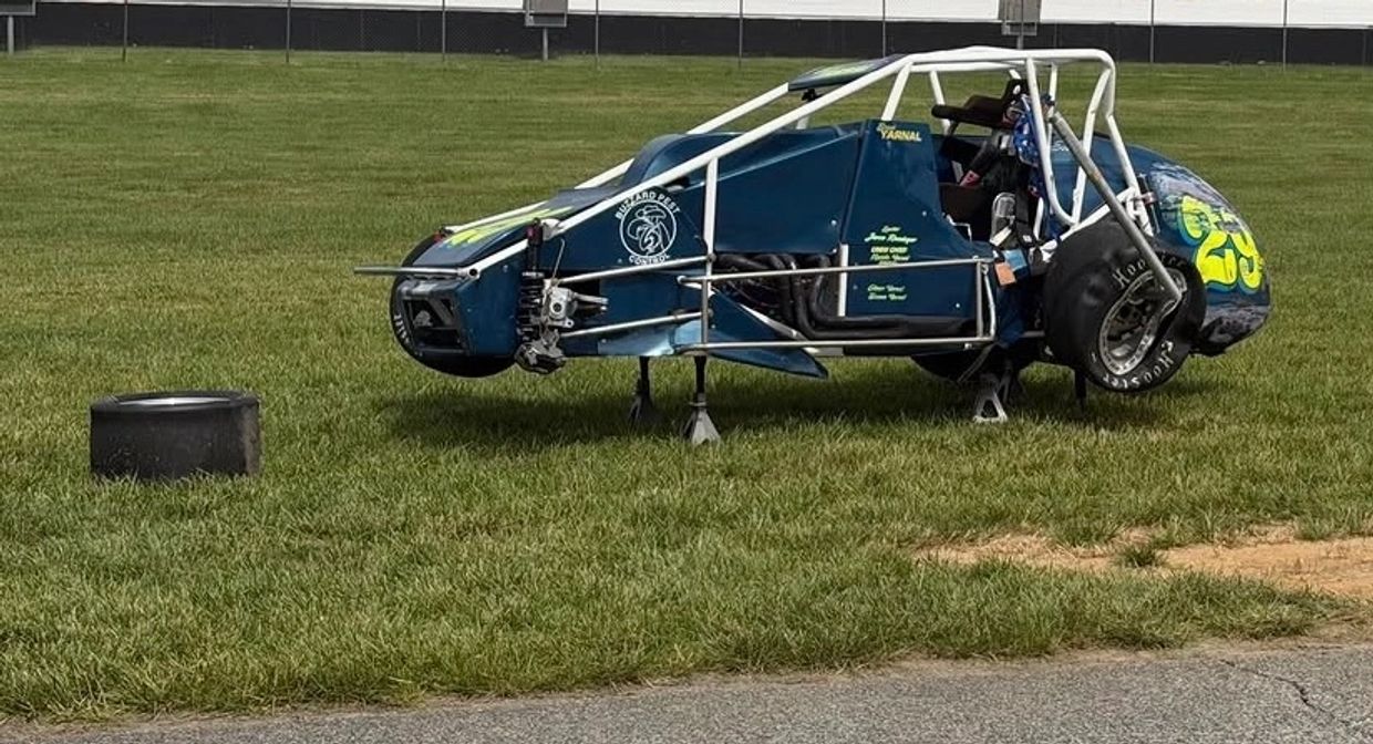 Car on jack stands.