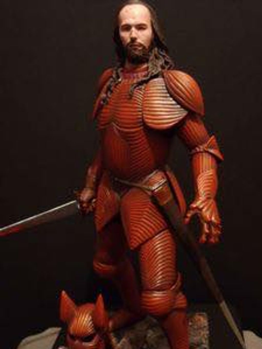 Image of Gary Oldman in the "dog face" armor from the film.
