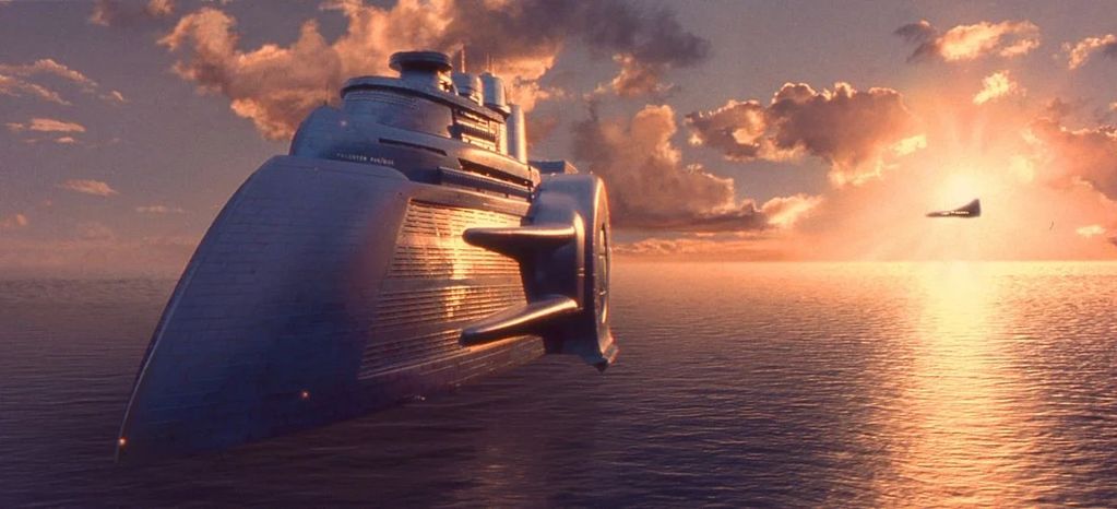 Large blue space cruiser over water with a sunset in the background along with another plane.