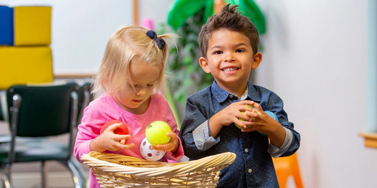 Two year olds sharing toys