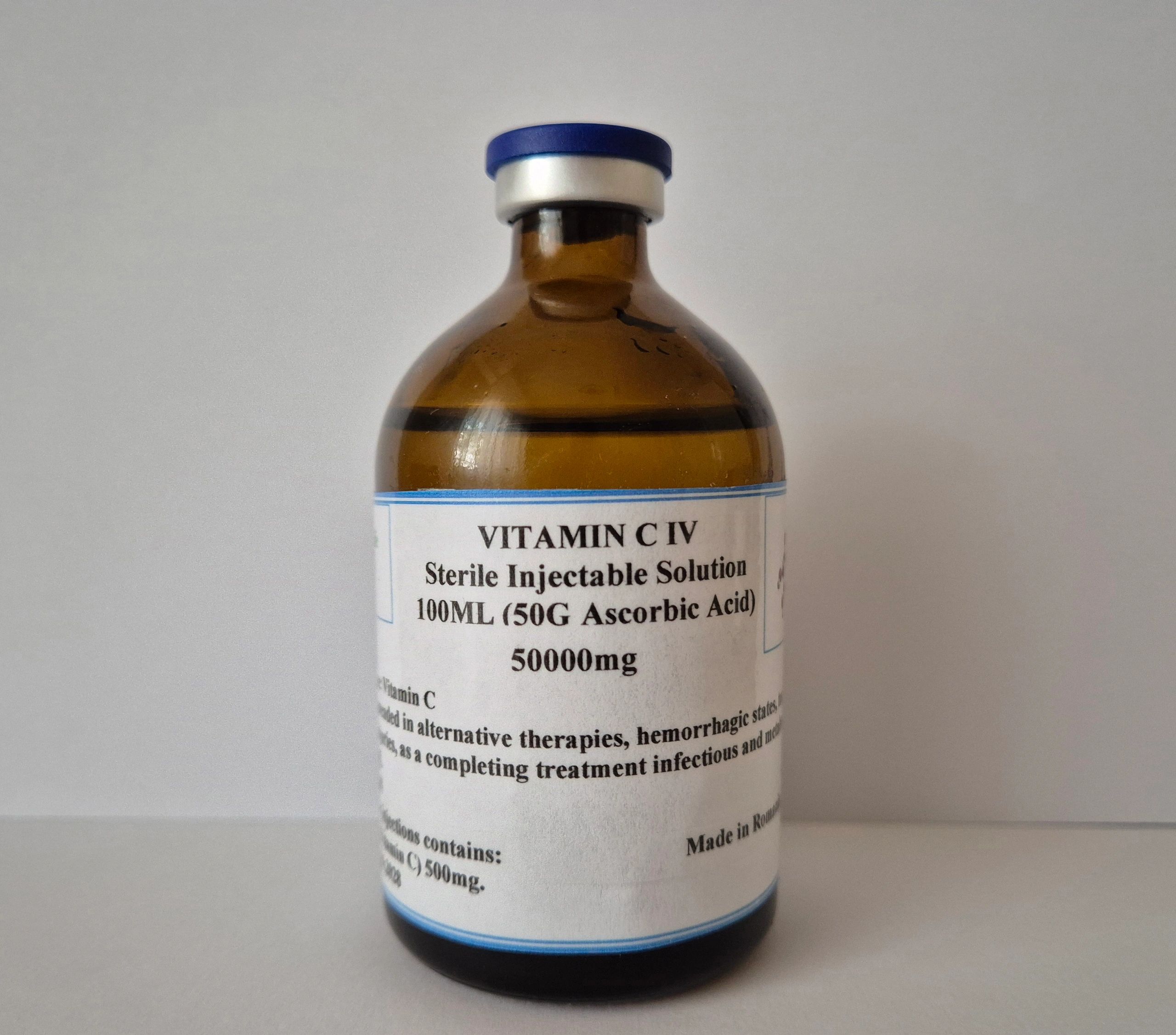 Brown glass bottle labeled Vitamin C IV sterile injectable solution.