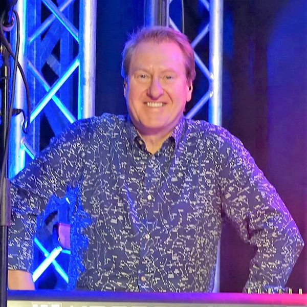 Jez Smith live on stage.