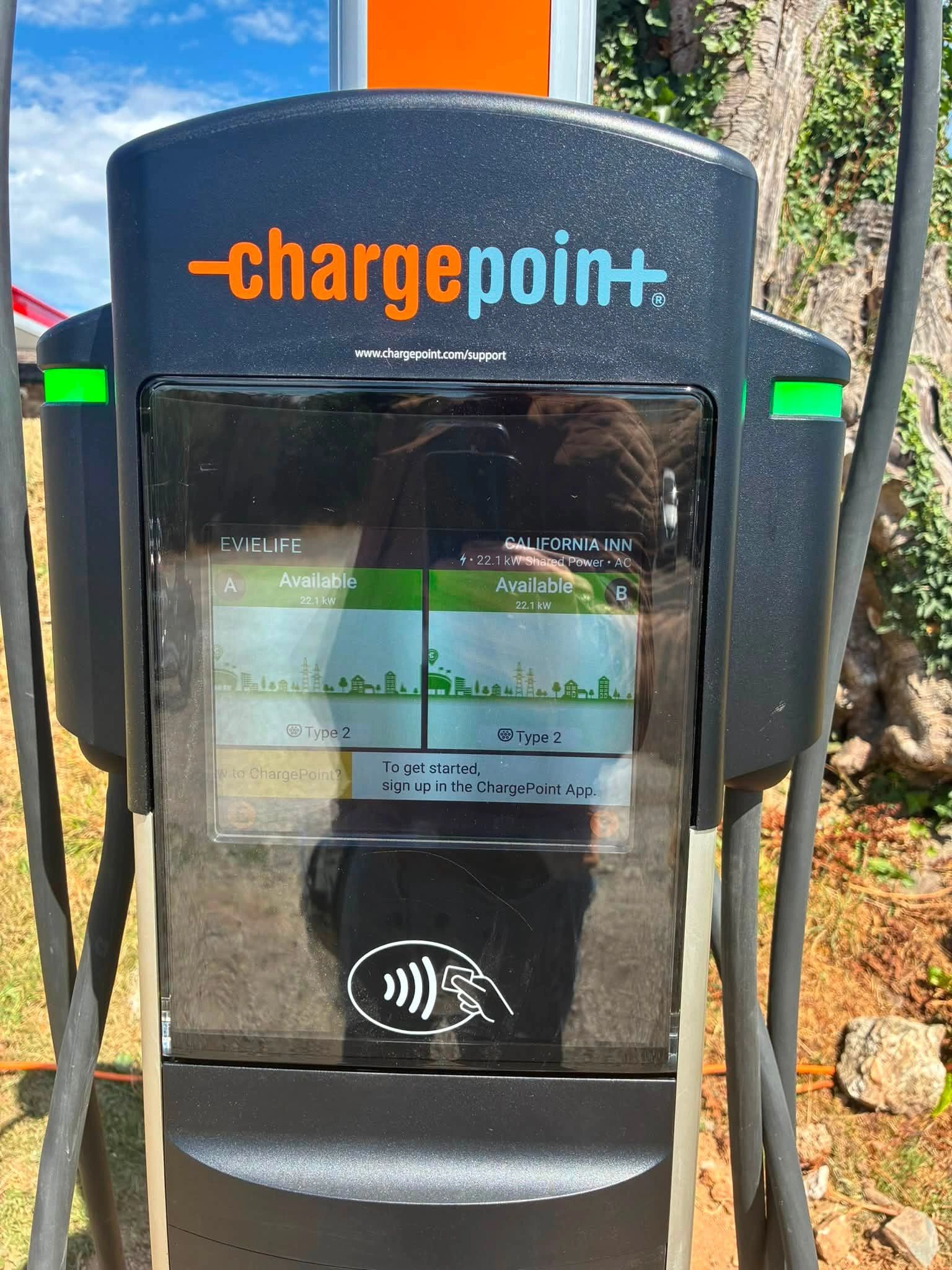 Electric vehicle charging station with ChargePoint branding.