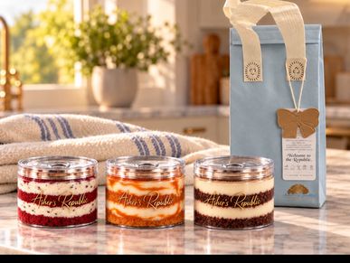 Handcrafted Asher's Republic cloud cake jars in Red Velvet-Oreo, Salted Caramel, and Tiramisu. 