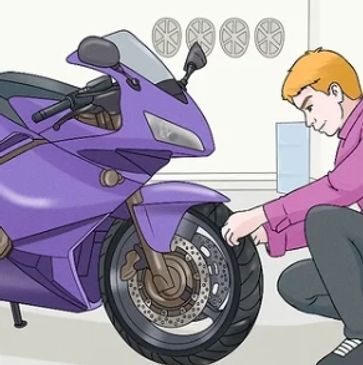 inspecting motorcycle tire