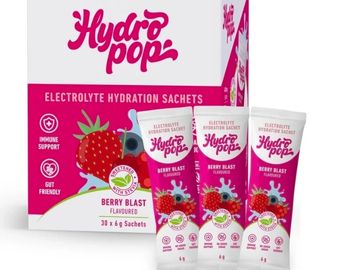 Hydro Pop electrolyte hydration sachets in Berry Blast flavor with immune support and gut-friendly benefits.