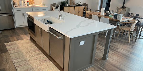 Kitchen cabinet refinishing can include just an island