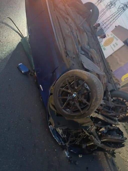 Photo of a damaged blue BMW, purportedly linked to the incident Photo of a damaged blue BMW, purportedly linked to the incident