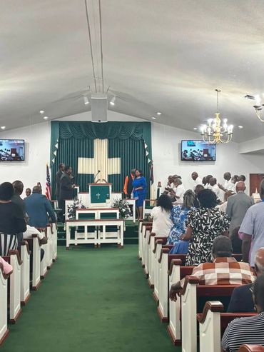 Congregation gathered in a church during a service.
