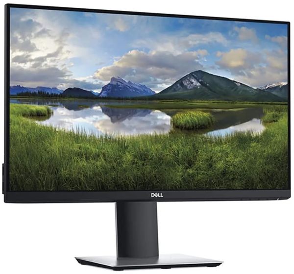 Dell monitor displaying a mountain landscape.