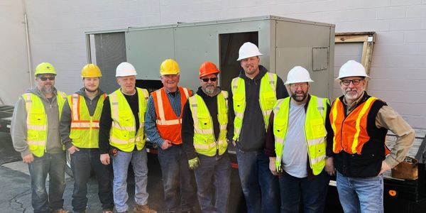 K&B Plumbing and Heating crew on job site